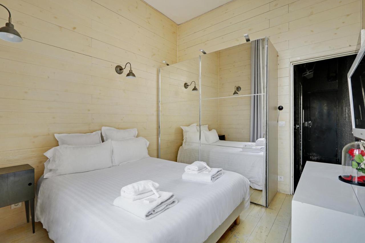 Pick A Flat'S Apartments In Le Marais - Rue Saint Merri Paris Exterior photo